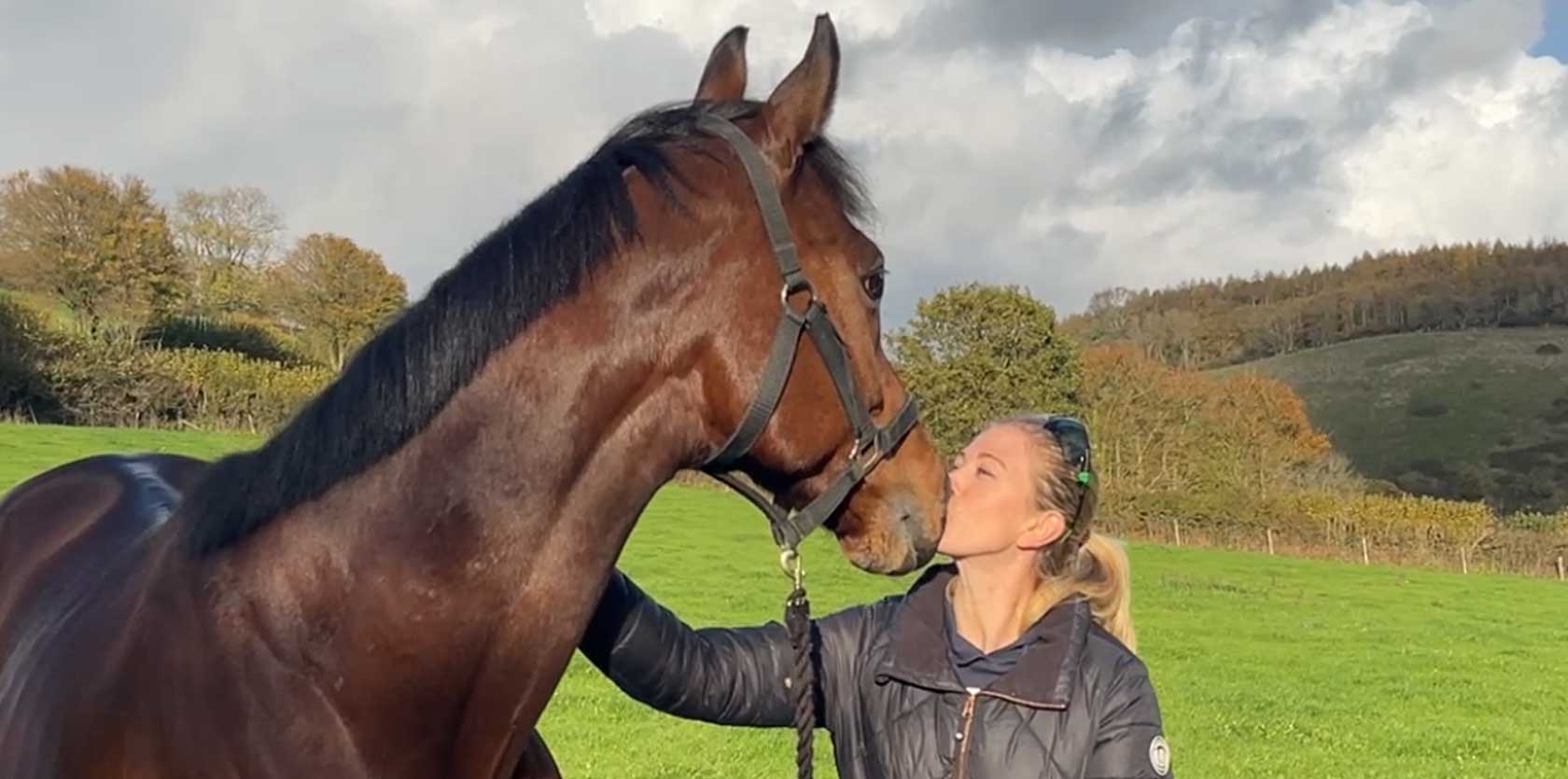 Evie with horse - professional pet care Exeter